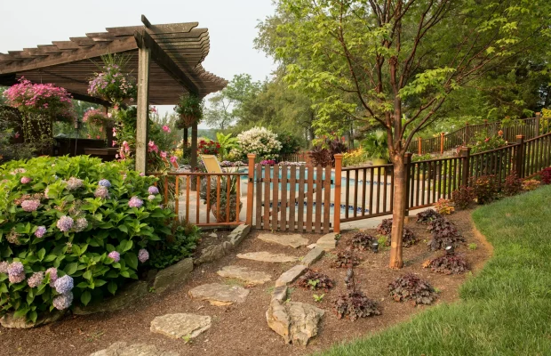 Summer-Landscape-Natural-Stone-Path-Pool-Garden-Beds-Hydrangeas-Hanging-Baskets